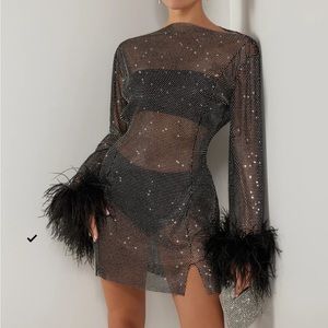 Heiress black crystal feather trim dress. Santa brands look alike. Like new